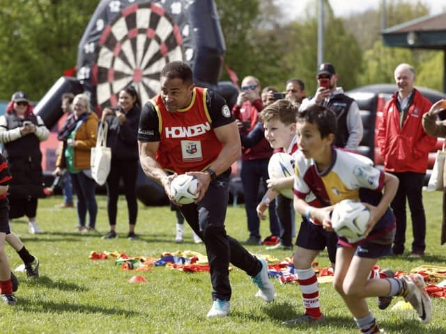Jason Robinson plays rugby with attending clubs