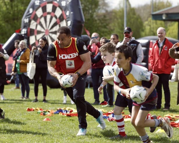 Jason Robinson plays rugby with attending clubs