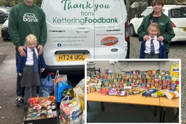 Representatives from Kettering Food Bank receiving the donations from Broughton Primary School