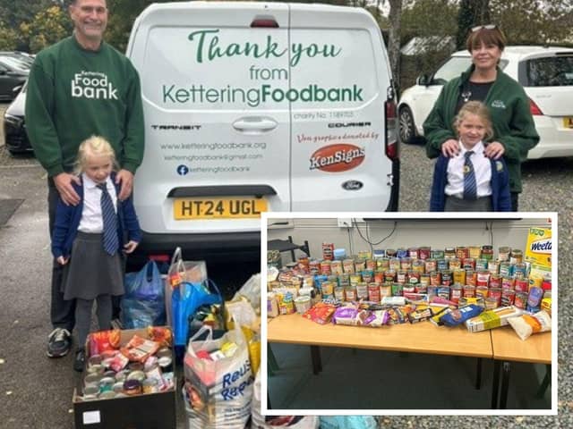 Representatives from Kettering Food Bank receiving the donations from Broughton Primary School