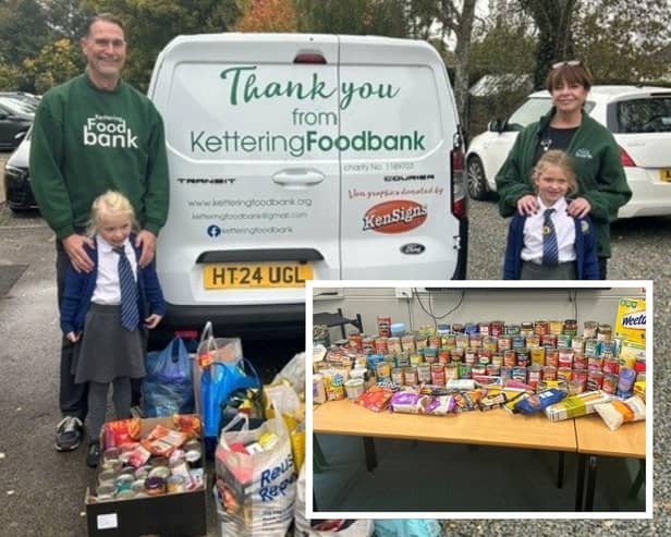 Representatives from Kettering Food Bank receiving the donations from Broughton Primary School