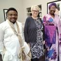 Manager Joanna and traditionally dressed staff