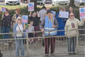 Freddie Harris (centre) with protesters in Wellingborough/UGC