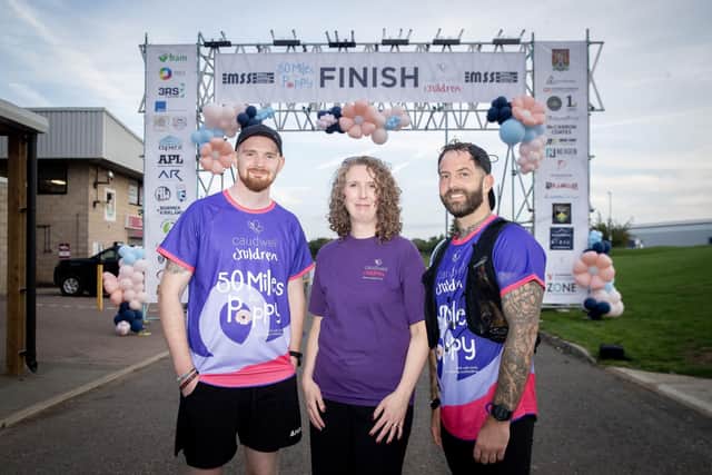 MSS charity runners Jordan Harrison and Ben Ekins with Amy Helliwell, Marketing Operations Manager for Caudwell Children