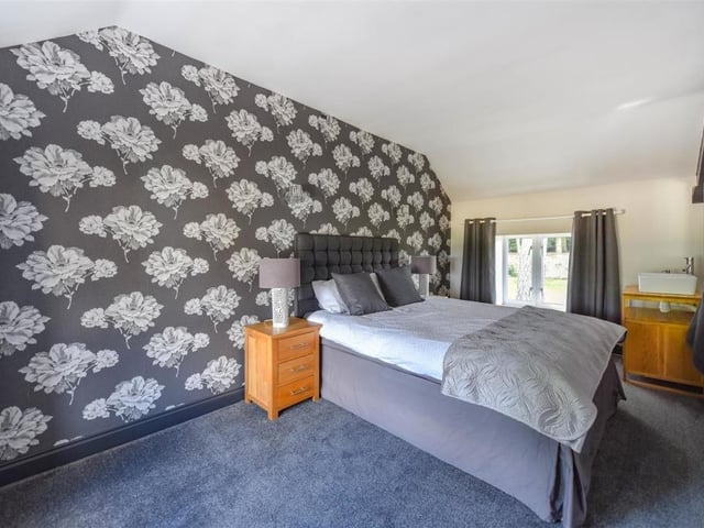 A traditional five bedroom home that backs onto Althorp Estate woodland.