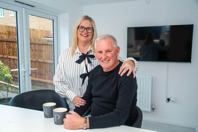 Paul and Natalie Curtis in their new kitchen.