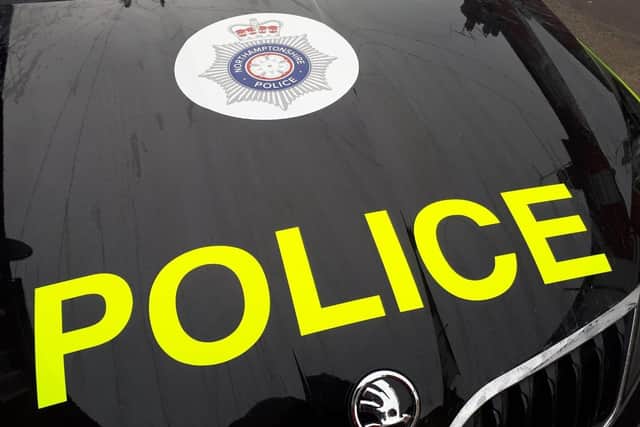 Police arrested four men and a woman during raids which uncovered firearms in properties in in the Corby area on Thursday