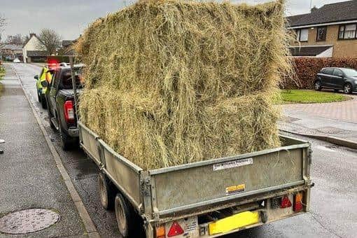 Northamptonshire Police stopped this driver with an insecure load for which he argued ‘that their own weight holds them on’.