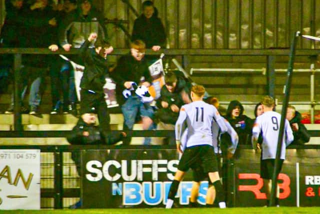 Corby Town players and supporters celebrate Harrah Jones' equaliser against Coleshill (Picture: Elizabeth Farr)