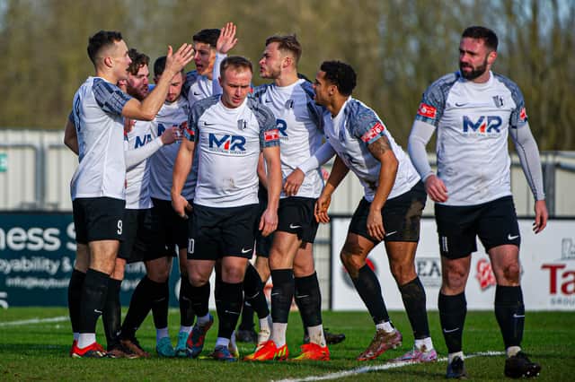 Corby Town celebrate Toby Hillard’s second goal in the 3-2 win over AFC Rushden & Diamonds (Picture: Jim Darrah)