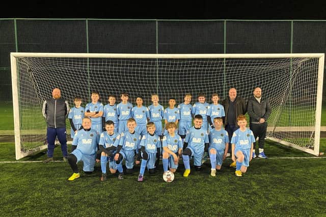 Fran (second from right at the back) with the full team and coaches