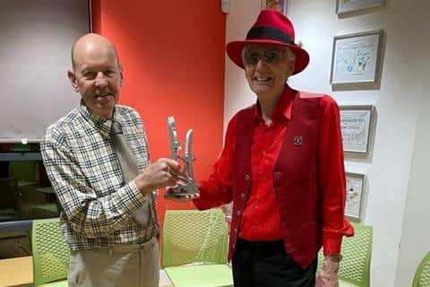 Peter Moden (left) receives his award from Paul Balmer (right)