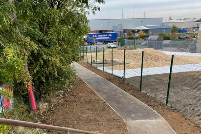 The path that links Rockingham Road and Courrier Road has had to be moved slightly