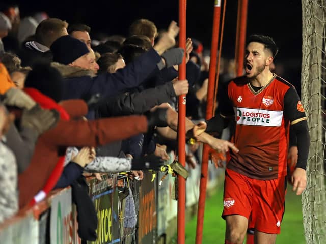 George Forsyth celebrates with the Kettering Town fans after the remarkable 3-2 win over Boston United at Latimer Park. Pictures by Peter Short