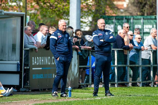 Gary Mills and assistant-manager Darron Gee watch on during Corby Town's 1-0 defeat at Spalding United. Pictures by Jim Darrah