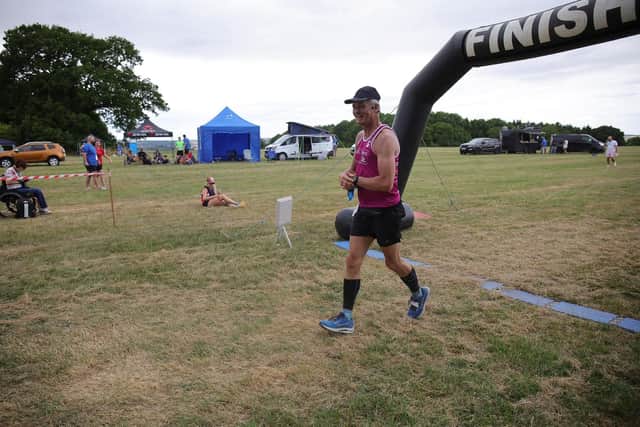Runner finishing a lap ready to go again