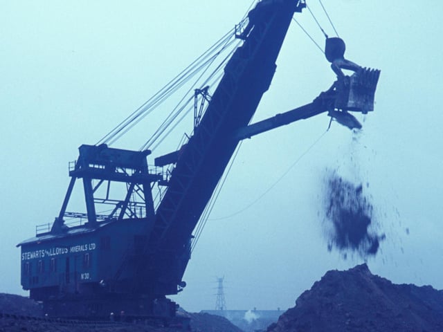 Digger at work on the mines which surrounded the vast Corby Steelworks situated on the Northamptonshire ironstone bed. (Photo by Rail Photo/Construction Photography/Avalon/Getty Images)