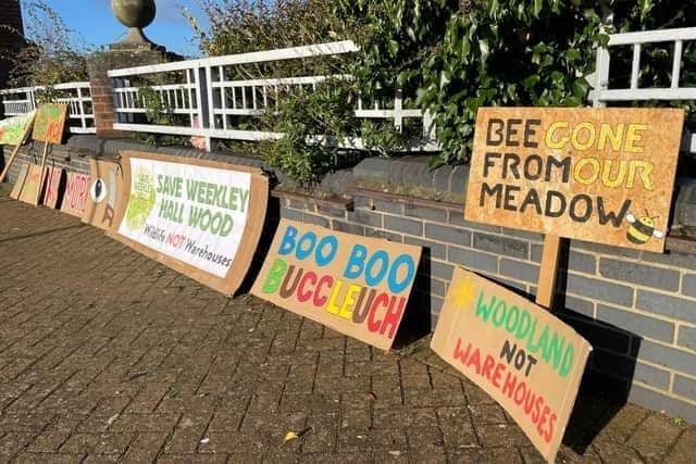 Placards left outside the inquiry on day one
