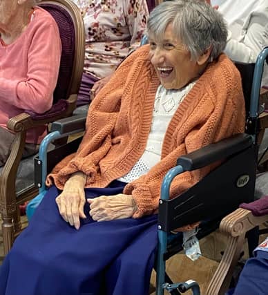 Smiling from the comfort of her seat, Claremont Parkway residents were actively involved with the music