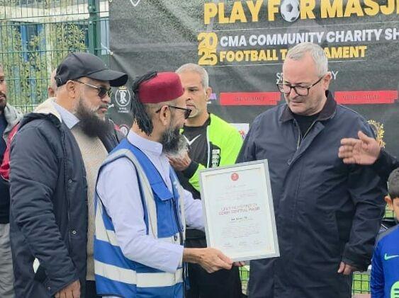 Lee Barron MP recieving award.