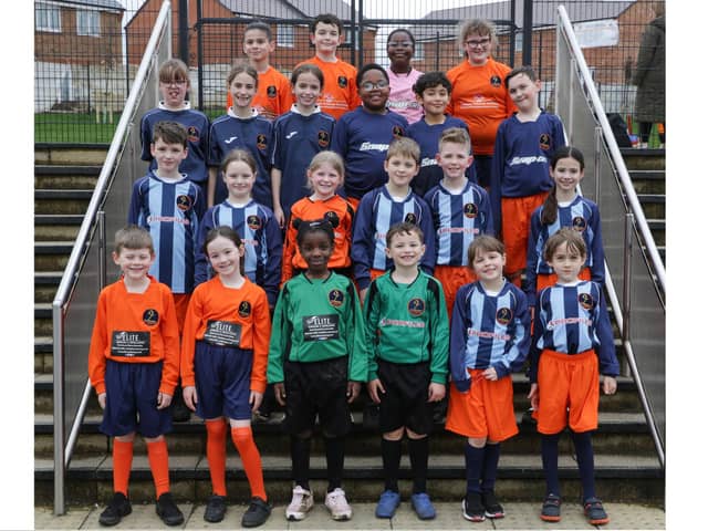 Pupils in their new kits/ Hayfield Cross Primary School