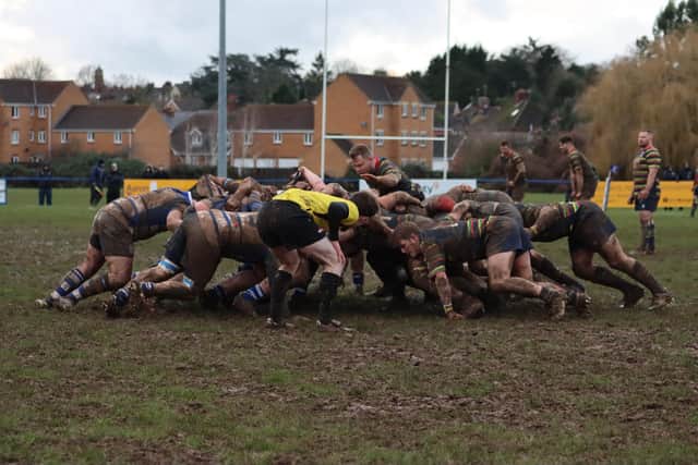 Kettering and Old Scouts scrum down in the mud bath