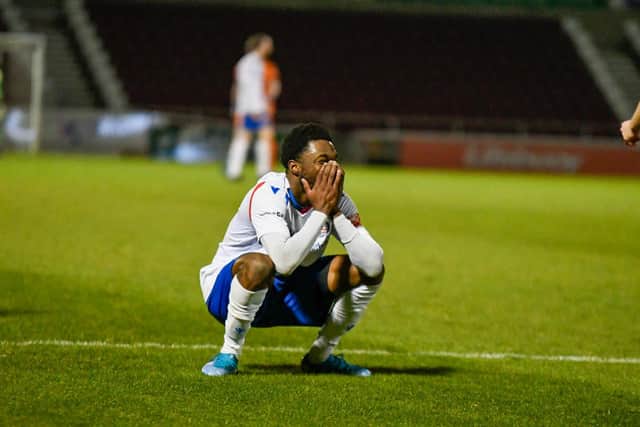 AJ George's reaction to a missed chance summed up the whole evening as AFC Rushden & Diamonds lost in the final of the NFA Hillier Senior Cup. Picture courtesy of Hawkins Images