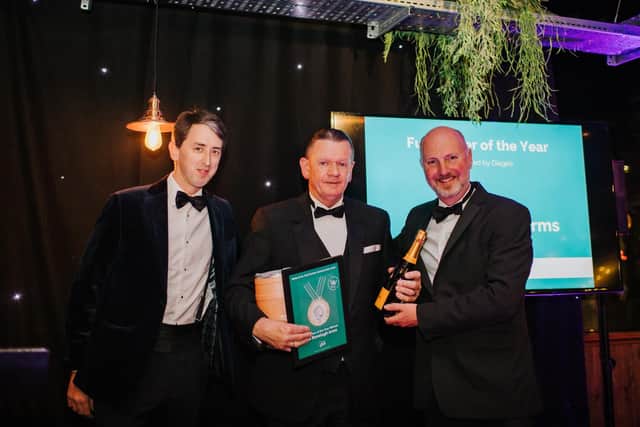 Chris O’Reilly, centre, at the 2022 Wells & Co Pub Partner awards