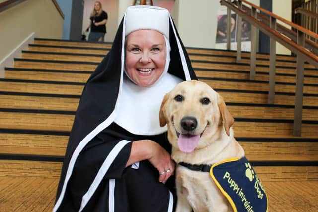 Wendi Peters and guide dog puppy Coco