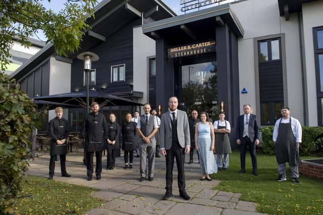 Staff outside the refurbished Miller & Carter Kettering /Miller & Carter