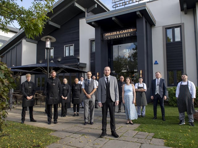 Staff outside the refurbished Miller & Carter Kettering /Miller & Carter