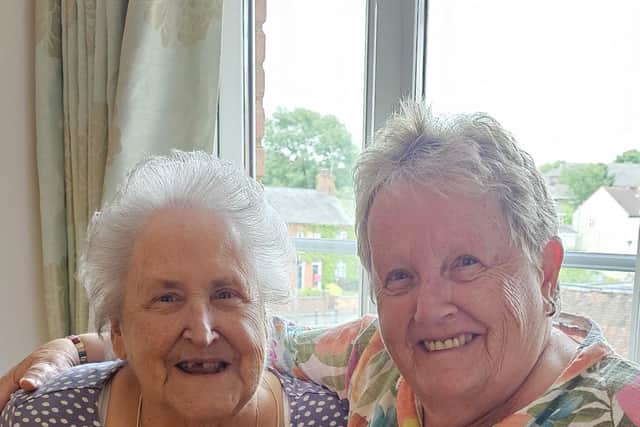 Jenny and Glennis working on the book together