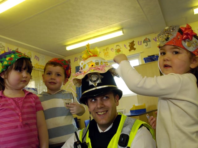 Corby Rhymetyme playgroup Easter Bonnets: PC Brad Wilson, with Channell, Christopher, and Ilkay, in 2007