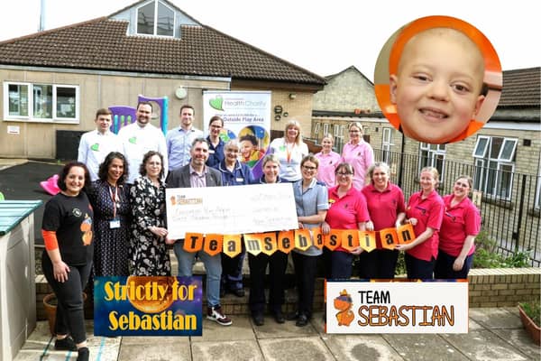 Strictly for Sebastian: Sebastian Nunney's parents Gregg and Lindsay present a cheque for £60,000 from the Strictly for Sebastian dance event organised by Lisa Tartaglia from MaSh Dance in Kettering (on left) to Disney Ward for a new outdoor area/National World