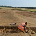 A part of the Roman Road in Corby being cleaned