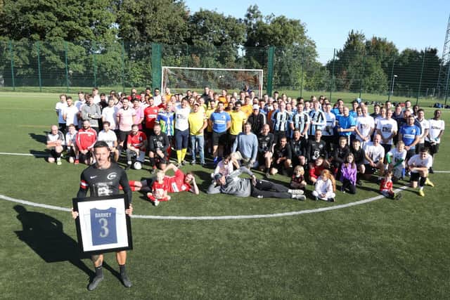 The teams before the tournament gathered to honour Mark 'Barney' Barwell