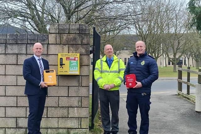 Pictured, from left to right: Principal of Brooke Weston Academy, Shaun Strydom, buildings manager Shaun Houghton and Chairman of North Northants First Responders, Paul Nelson.