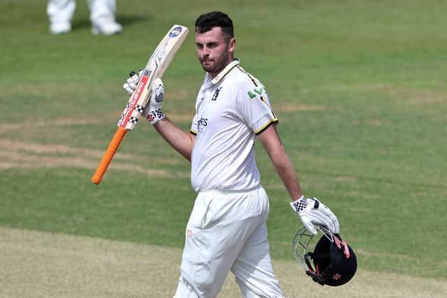 Dom Sibley celebrates his century at the County Ground