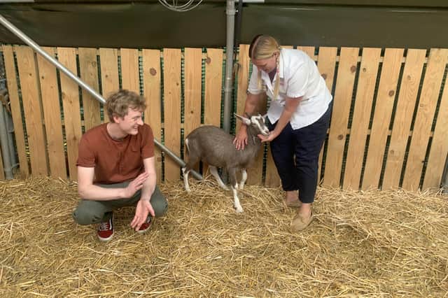 Comedian James Acaster with James Acaster, the goat, at Wicksteed Park