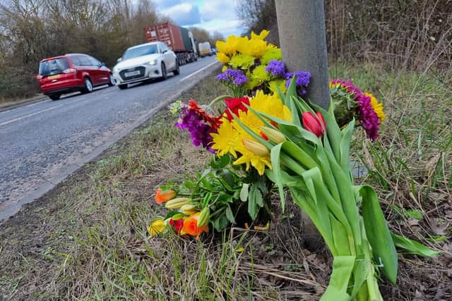 Floral tributes left by the side of the A45 last year/National World