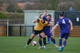 Curtis Hartley battles with a Loughborough Dynamo opponent during Corby Town's 2-1 defeat last weekend. Picture by Jim Darrah