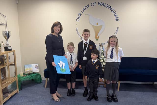The education secretary was greeted by pupils ahead of the roundtable event, who gifted her with a handmade card/IMG