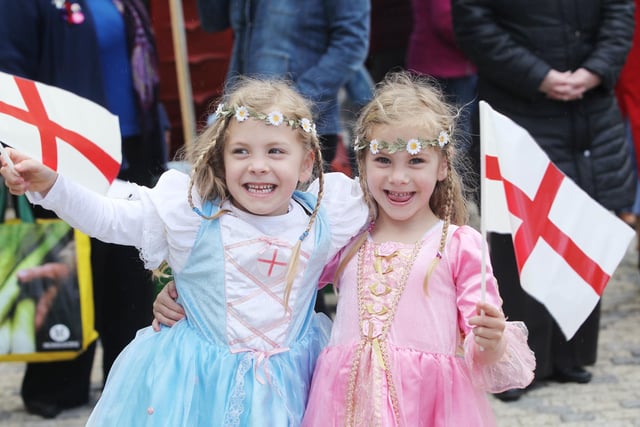 Twins Megan and Tamzin Rowthorn, age five, celebrate St George's Day in Rushden town centre 2012