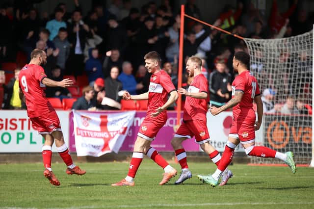 Connor Johnson celebrates after he gave Kettering Town the lead against Gateshead. Picture by Peter Short