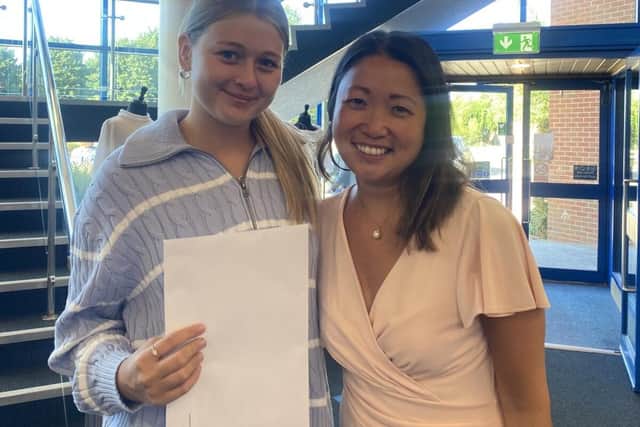 Head Girl, Amy, celebrates with Dr Lee after receiving confirmation to study Medicine at Birmingham