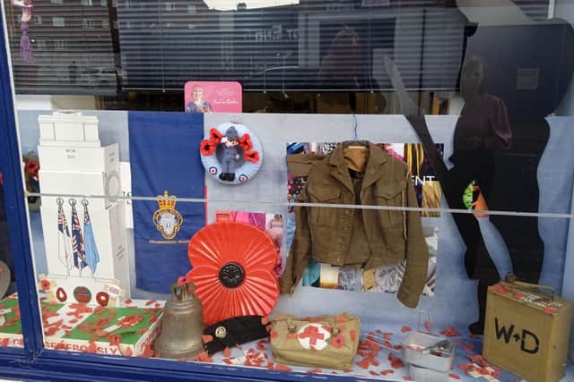 The store window was decorated for Remembrance in 2022