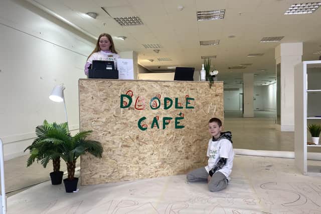 The Doodle cafe lets you doodle to your heart’s content, on the floor, walls and even the staff