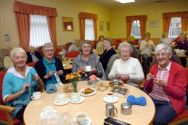 Sponsored knitting and a coffee morning. What more could you want from this event 14 years ago. But who do you recognise in this scene?