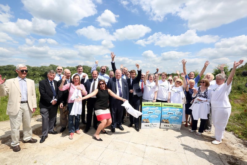 Eric Pickles, then Secretary of State for Communities and Local Government, visits the site with MP Peter Bone and the supporters of the Yes campaign when the scheme was finally approved in June 2014