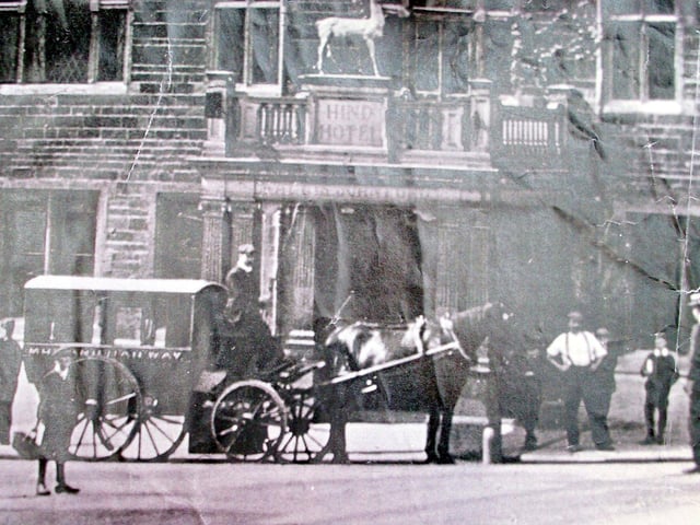A horse-drawn carriage waiting outside the Hind Hotel in Wellingborough